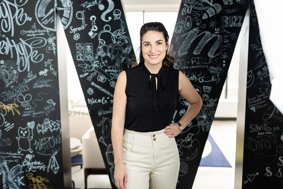 Mary Catherine Pflug portrait in front of the Monotype "M"