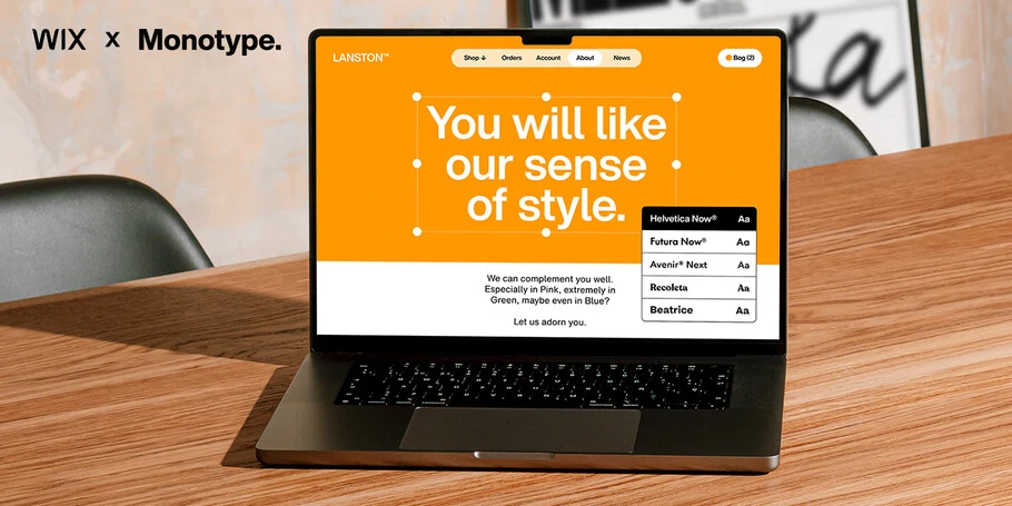 Wix x Monotype Partnership PR Newsroom Image. Image of laptop on a table with white text on an orange background. The image showcases selecting the right typography for your project. Text says: "You will like our sense of style." Type style menu options are displayed. The Wix X Monotype logo lockup is in the upper left corner.